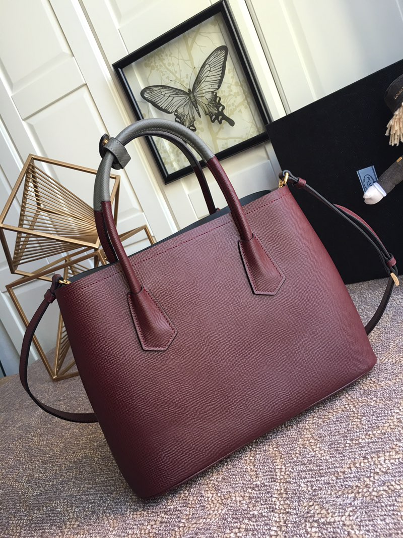 Pra*a top handle bags